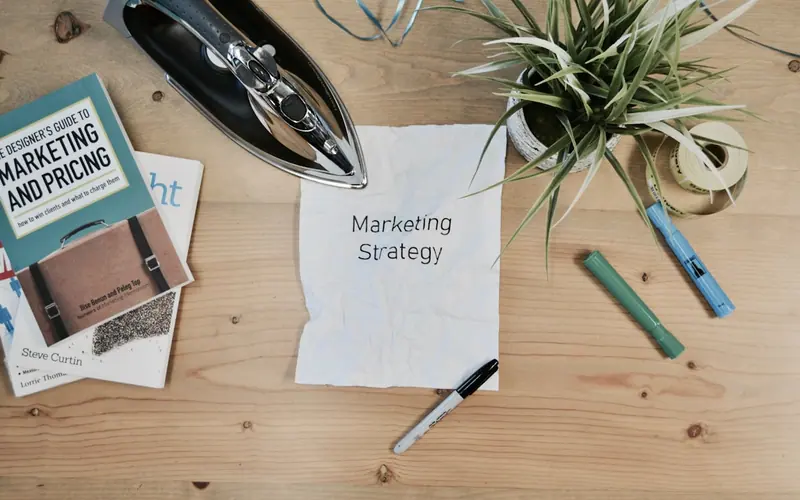 Marketing strategy notes and stationery on a desk
